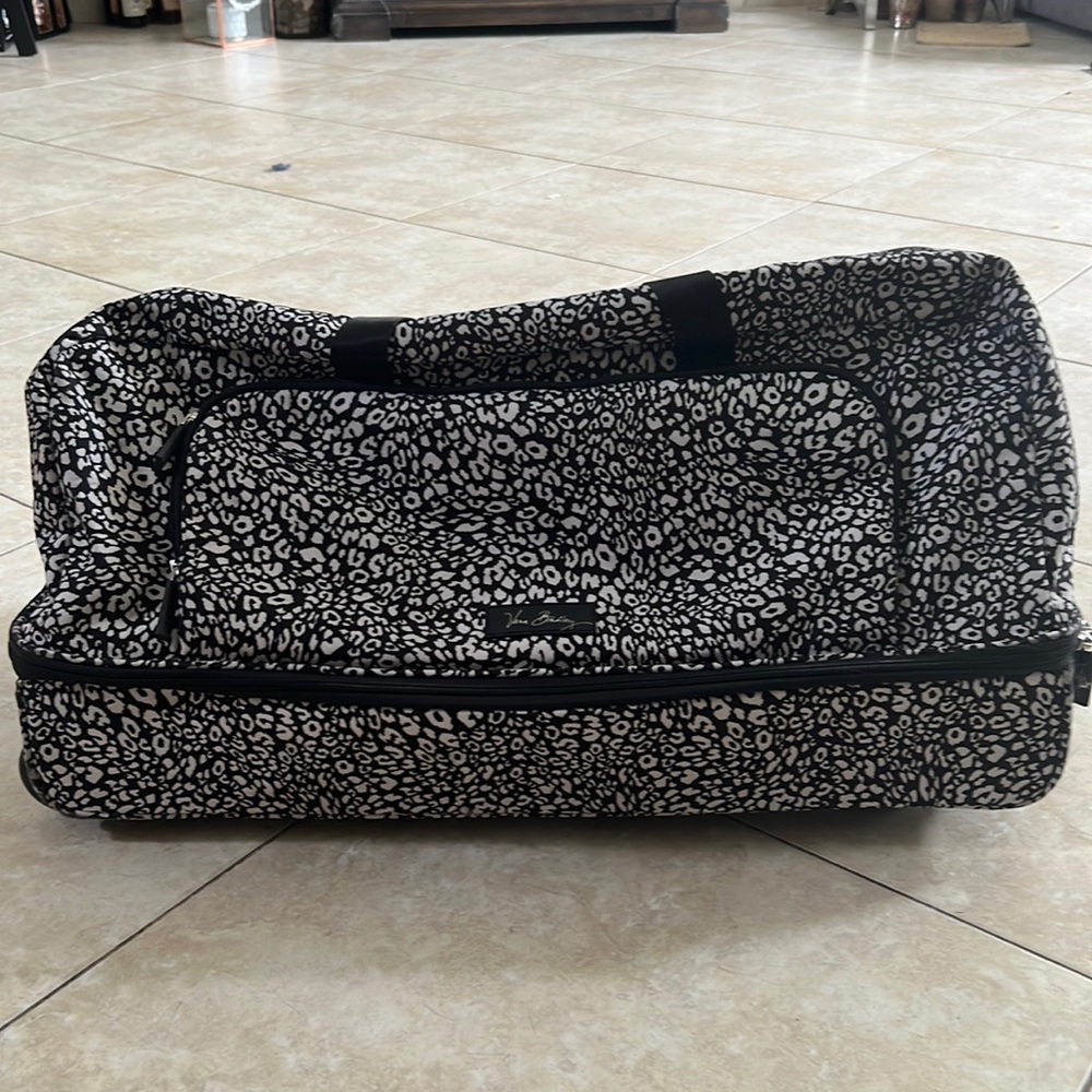 Vera Bradley 27” large lighten up wheeled luggage in Camocat. Like new!